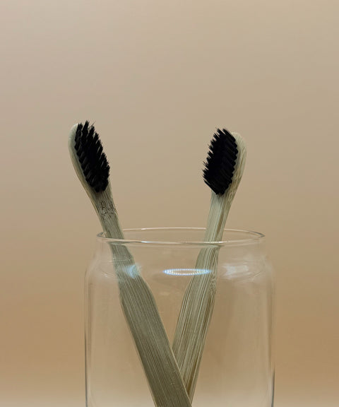 Bamboo toothbrush with black bristle made in Bali